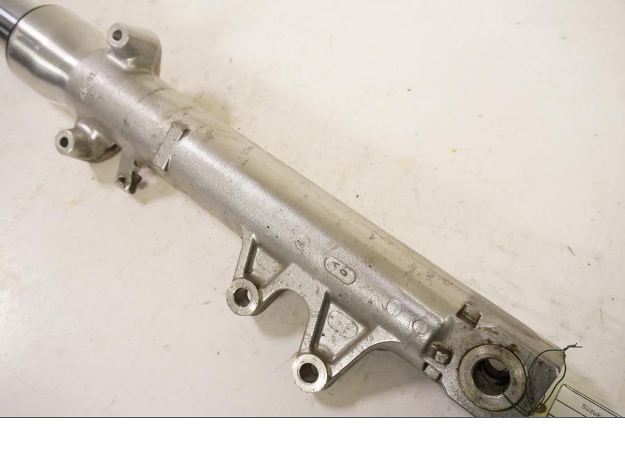 Vänster sida på Gaffelben från en Suzuki SV 650 -1999 motorcykel.