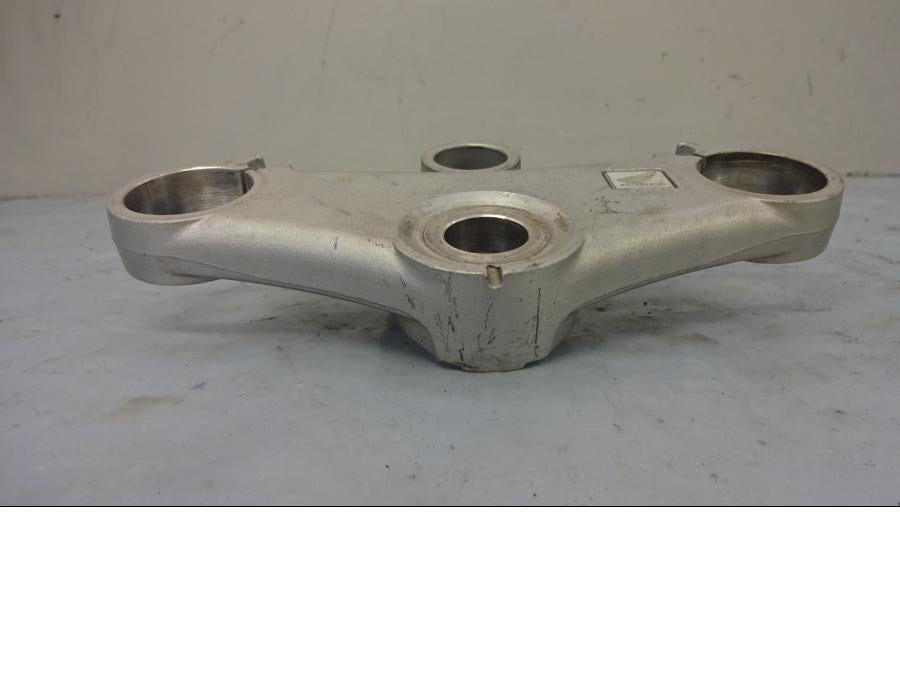 Vänster sida på Gaffelkrona från en Honda VTR 1000 F -1997 motorcykel.