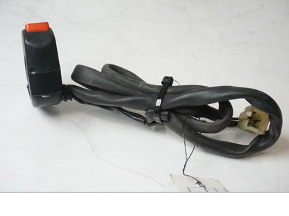 Snett uppifrån på <p>Styrelreglage höger från Honda XRV 750 1993.</p>

<p>Saknar plastpiggen för låsning på styret se bild.</p> motorcykel.