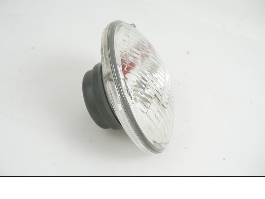 Baksidan på Strålkastarinsats från en H-D Dyna Wide Glide FXDWG -2004 motorcykel.