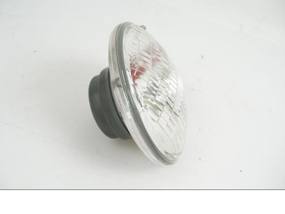 Baksidan på Strålkastarinsats från en H-D Dyna Wide Glide FXDWG -2004 motorcykel.