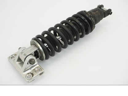 Baksidan på Stötdämpare från en Suzuki GSX-R 750 -1988 motorcykel.