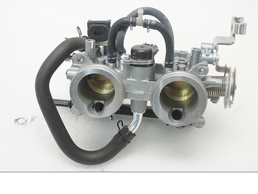 Höger sida på Spjällhus från en Kawasaki Z 400 -2020 motorcykel.