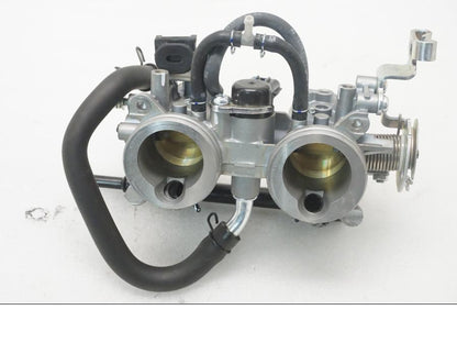 Höger sida på Spjällhus från en Kawasaki Z 400 -2020 motorcykel.