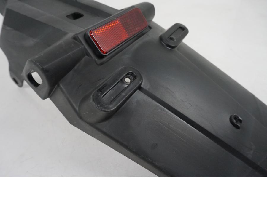 Vänster sida på Skylthållare från en Yamaha XT 660 X -2005 motorcykel.