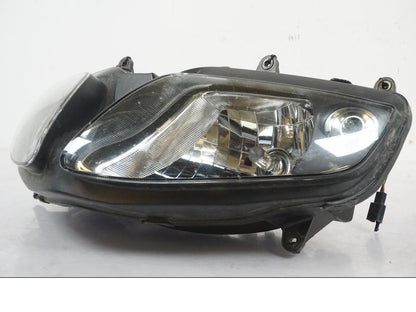 Vänster sida på Strålkastare från en Suzuki SV 650 S -2005 motorcykel.