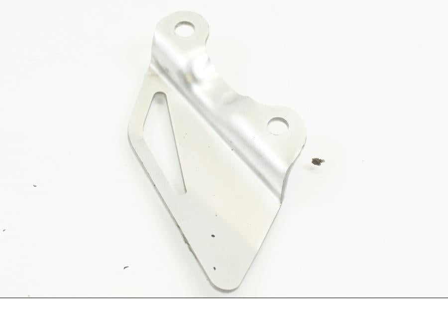 Vänster sida på Fotpinnehälskydd från en Honda CBR 1000 RR -2010 motorcykel.