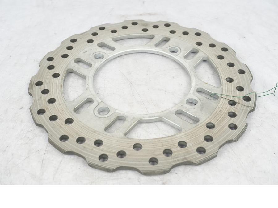 Framsidan på Bromsskiva från en Kawasaki Z 1000 -2011 motorcykel.