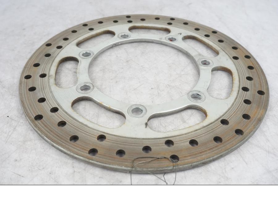 Vänster sida på Bromsskiva från en Kawasaki VN 1500 Classic Tourer -2003 motorcykel.