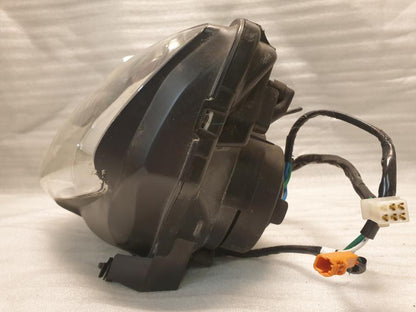 Baksidan på Strålkastare från en Honda CBR 125 R -2004 motorcykel.