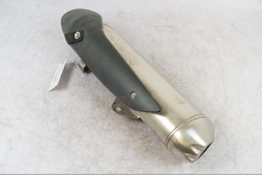 Vänster sida på Ljuddämpare från en Husqvarna TR 650 Strada -2012 motorcykel.