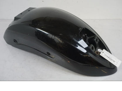 Framsidan på <p>Bakskärm från Kawasaki VN 900 Custom 2007.</p>

<p>Lackskador, skrapmärke, repor se bilder.</p> motorcykel.