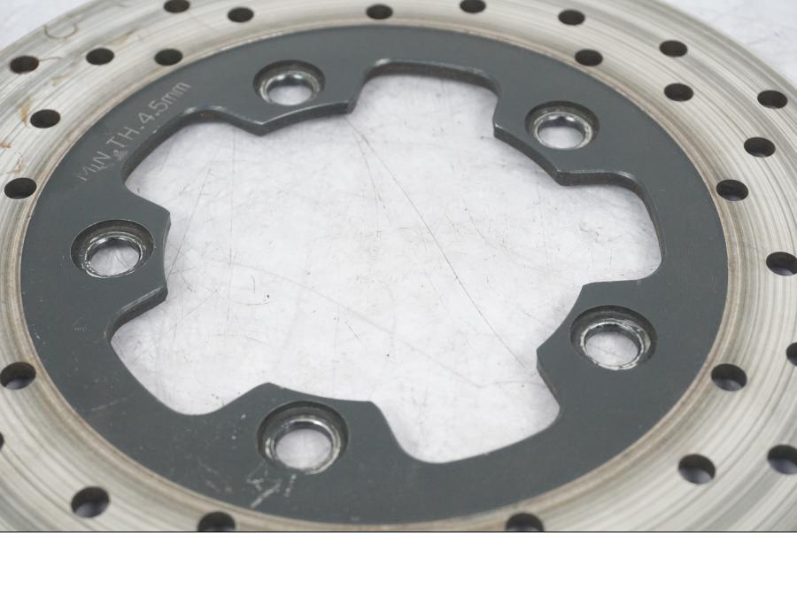 Baksidan på Bromsskiva från en Suzuki GSX-R 600 -1999 motorcykel.