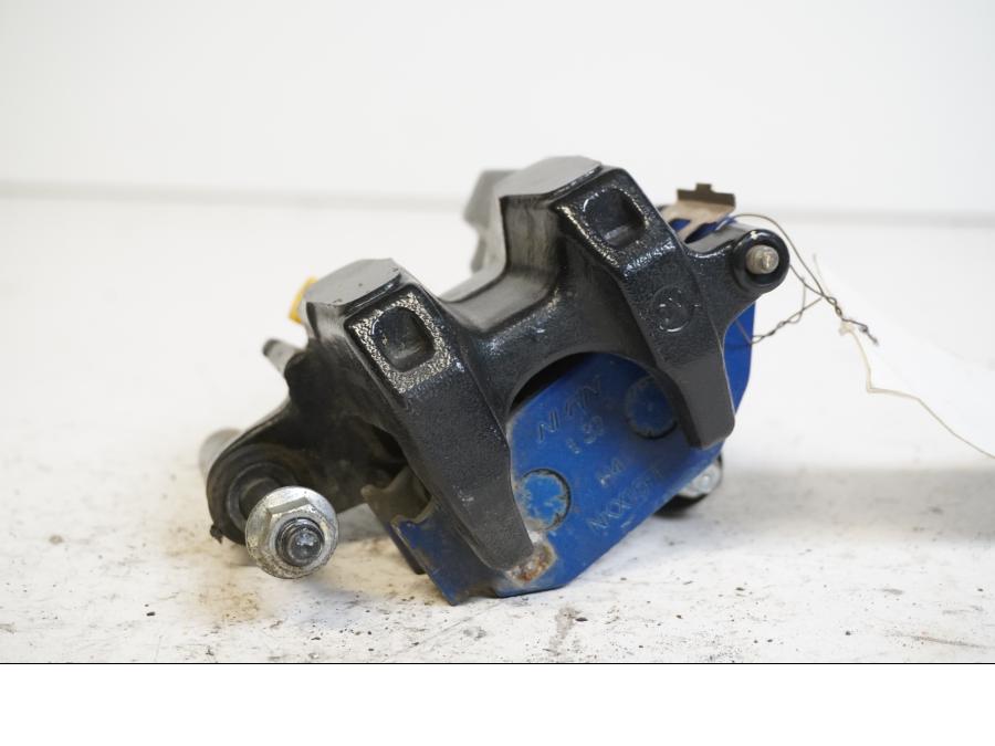 Baksidan på Bromsok från en Honda CBR 125 R -2011 motorcykel.