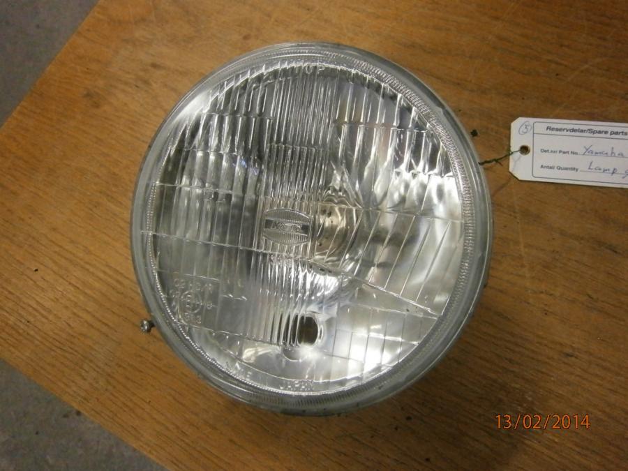 Framsidan på Strålkastarinsats från en Yamaha XVS 1100 -2003 motorcykel.