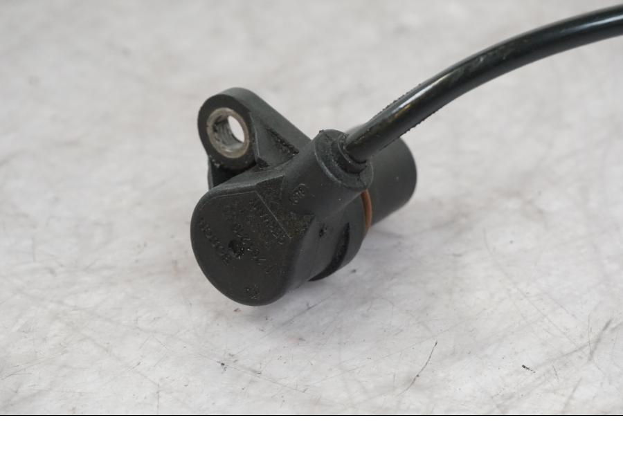 Snett nerifrån på Vevaxelsensor från en Buell 1125 R -2008 motorcykel.