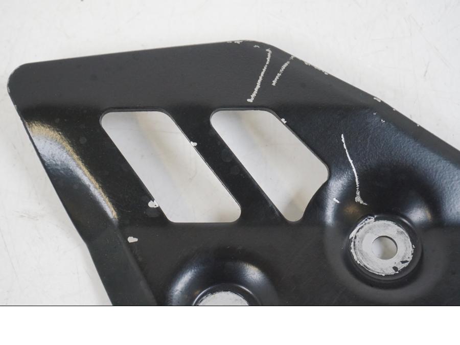 Vänster sida på Fotpinnehälskydd från en Yamaha XT 660 X -2005 motorcykel.