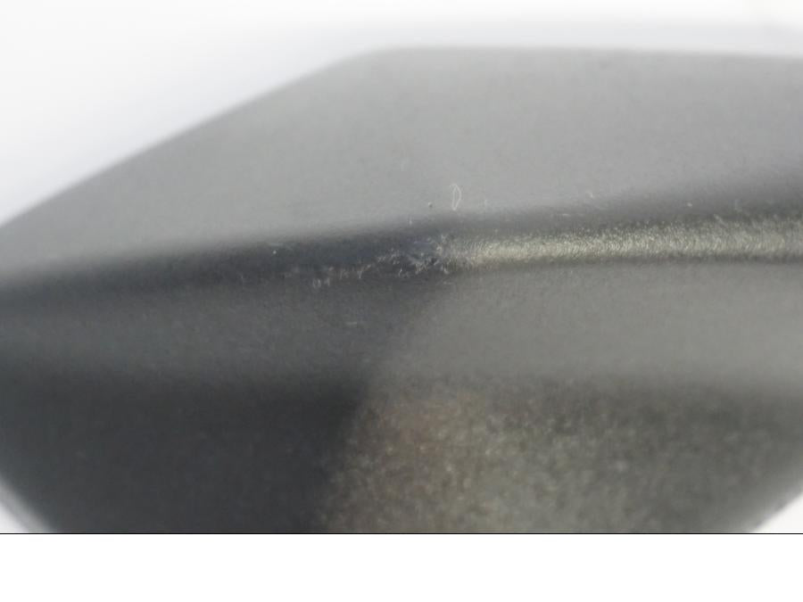 Vänster sida på Backspegel från en Kawasaki Ninja 300 -2015 motorcykel.