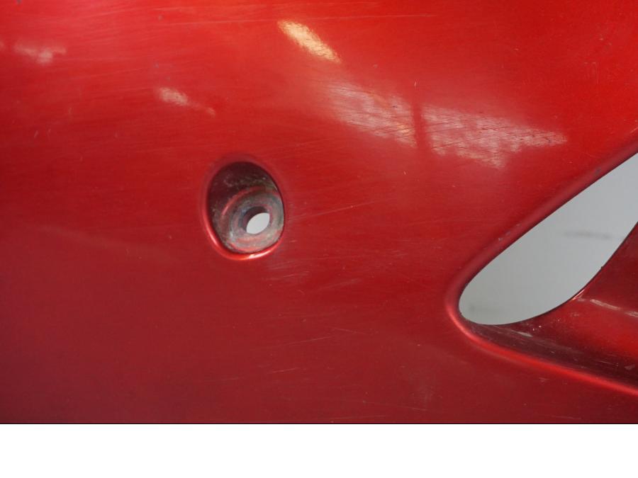 Vänster sida på Sidkåpa från en Honda CBR 1100 XX -1999 motorcykel.