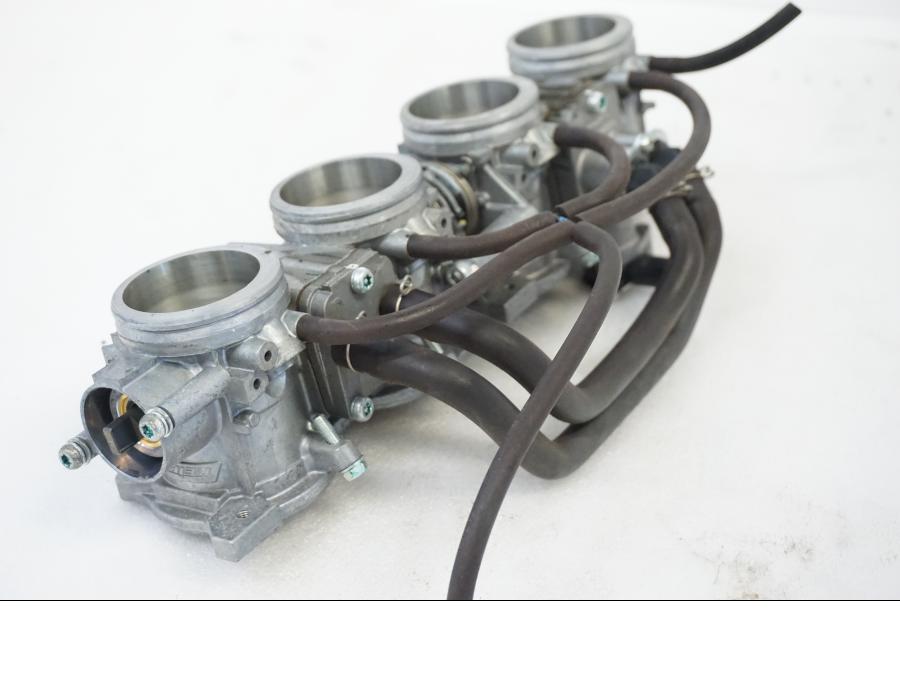 Vänster sida på Spjällhus från en Honda CBR 1000 RR -2010 motorcykel.