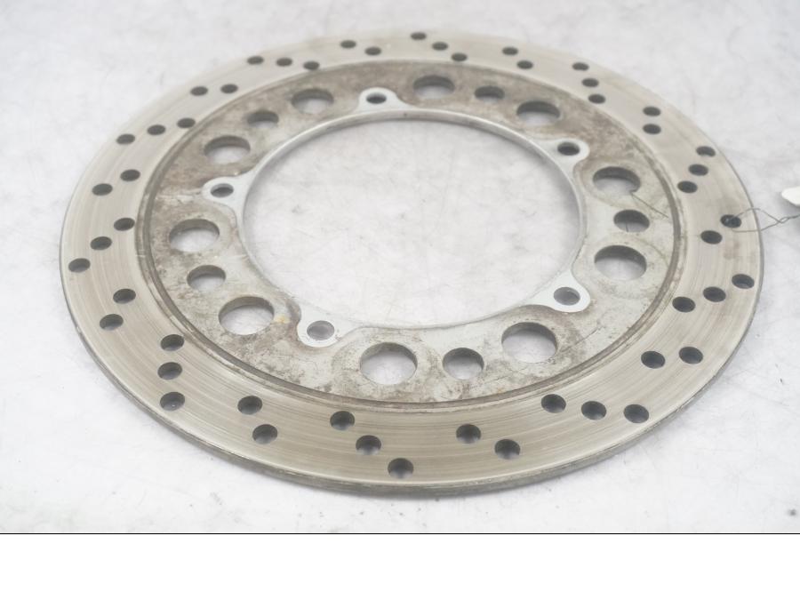 Framsidan på Bromsskiva från en Honda VT 600 C -1994 motorcykel.