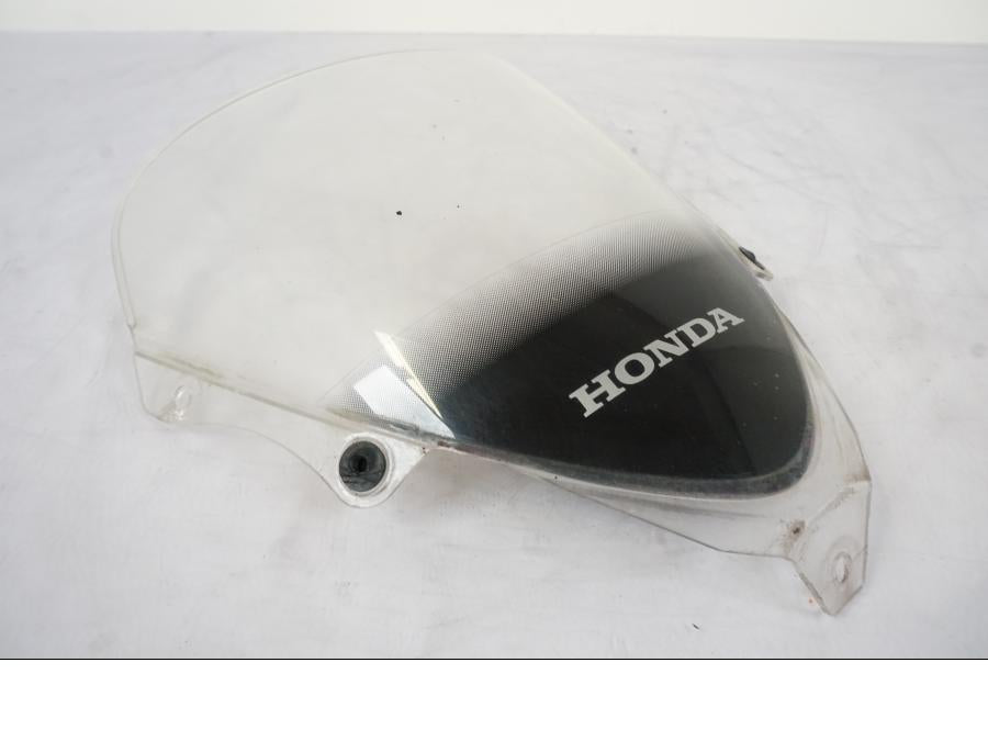 Framsidan på Vindruta från en Honda CBR 125 R -2006 motorcykel.