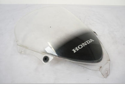 Framsidan på Vindruta från en Honda CBR 125 R -2006 motorcykel.