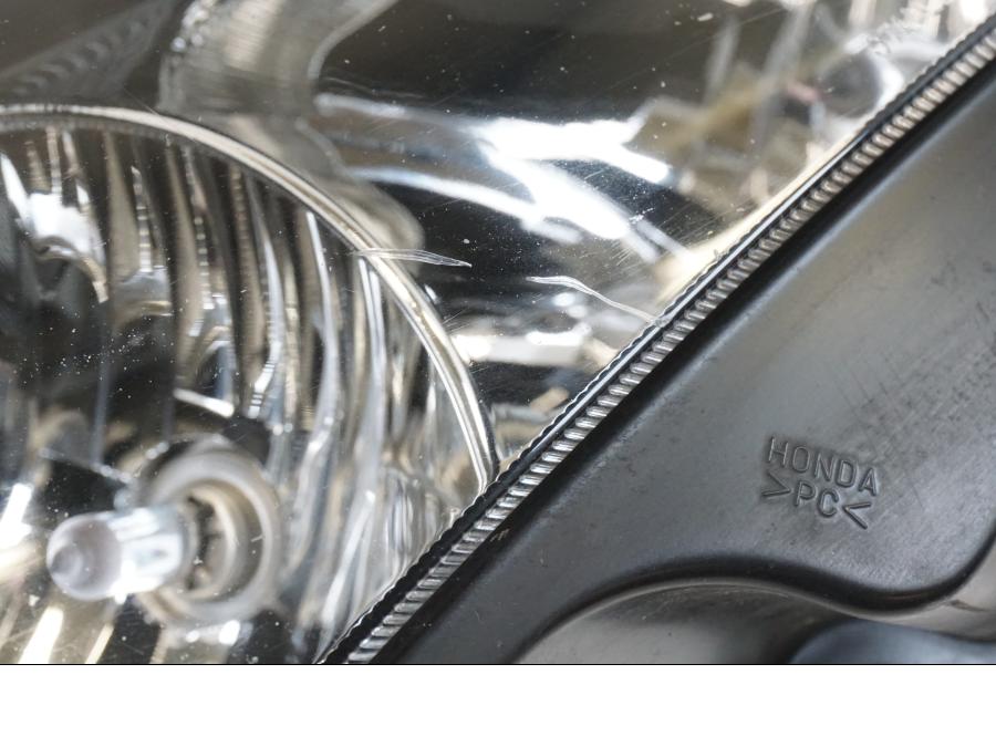 Baksidan på Strålkastare från en Honda VFR 800 -2003 motorcykel.