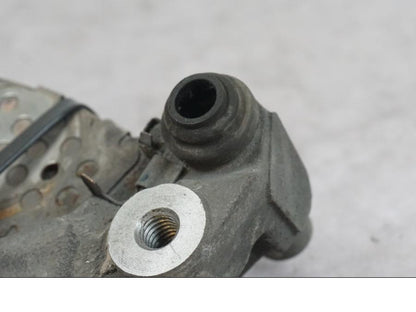 Baksidan på Bromsoksfäste från en Honda SH 300 A -2011 scooter.