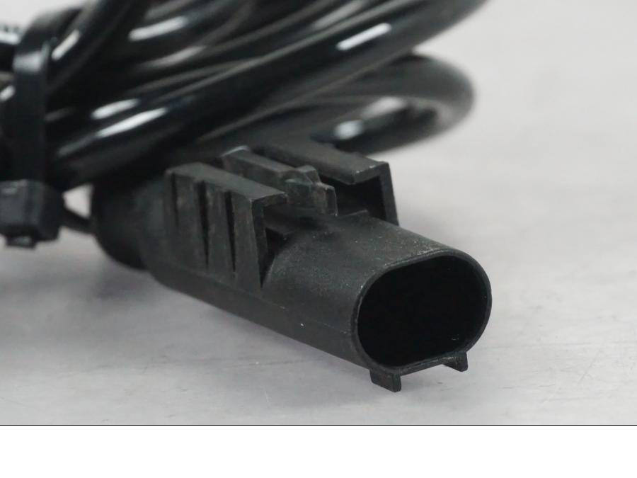 Baksidan på ABS givare från en Kawasaki ER-6N ABS -2010 motorcykel.