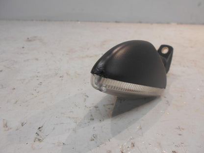 Höger sida på Blinkers från en Aprilia Tuono V4R -2016 motorcykel.