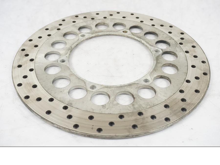 Snett uppifrån på Bromsskiva från en Yamaha XVS 1100 -2000 motorcykel.