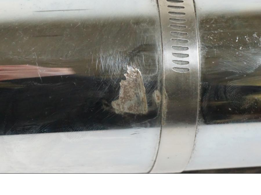 Vänster sida på Ljuddämpare från en H-D Fat Boy -2008 motorcykel.