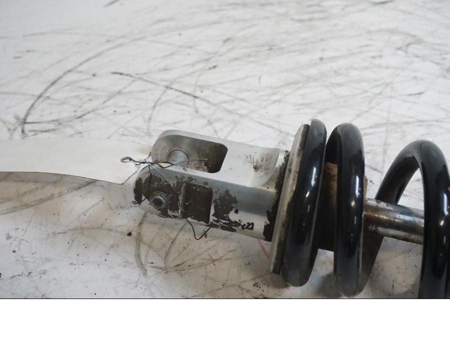 Vänster sida på Stötdämpare från en Husqvarna TR 650 Strada -2012 motorcykel.