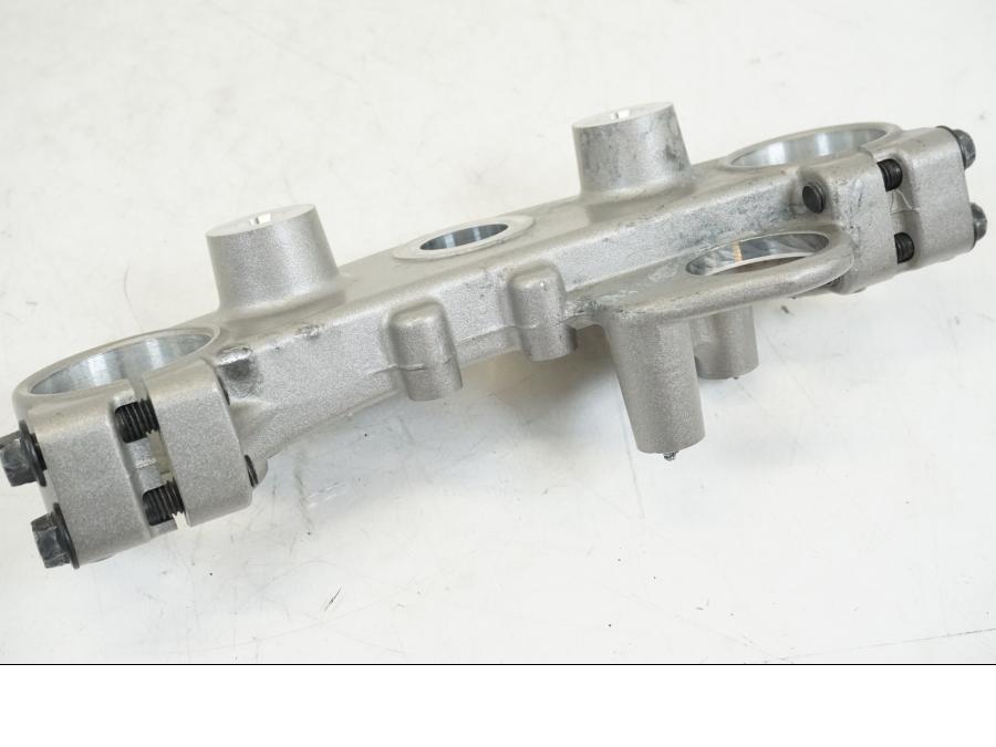 Höger sida på Gaffelkrona från en Yamaha WR 125 -2011 motorcykel.