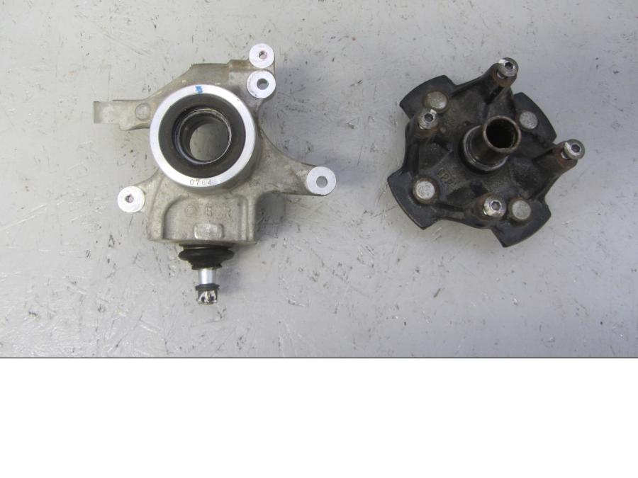 Framsidan på Spindel från en Suzuki LTA 750 XP E -2009 motorcykel.