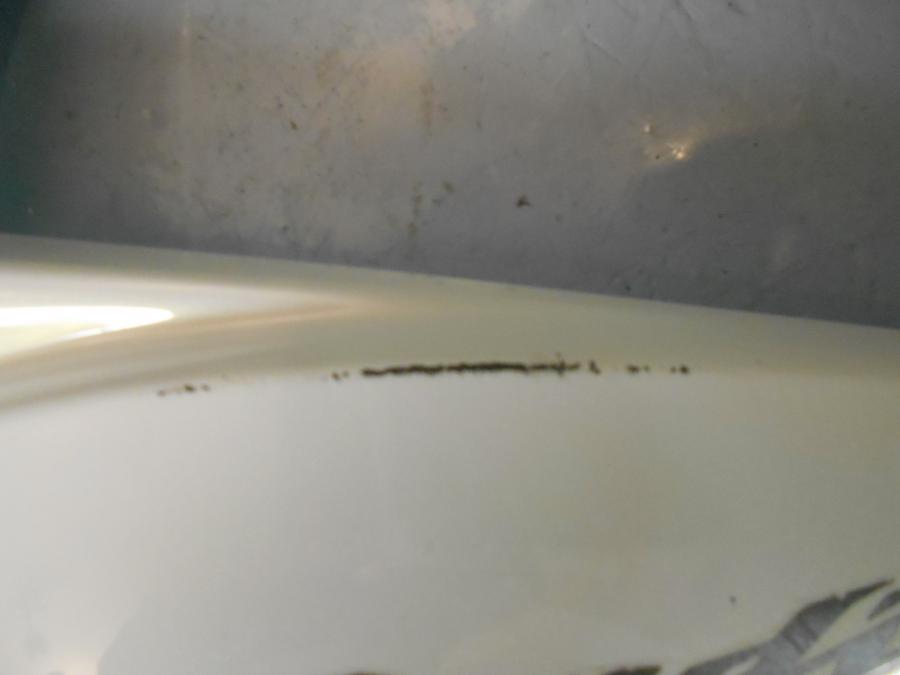 Baksidan på Bensintankskåpa från en Suzuki GSF 650 -2011 motorcykel.