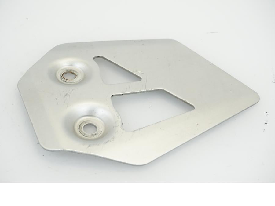 Baksidan på Fotpinnehälskydd från en Yamaha XT 660 R -2004 motorcykel.