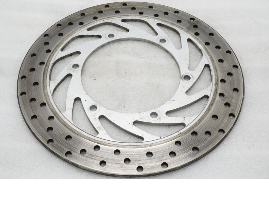 Framsidan på Bromsskiva från en Yamaha XVZ 13TD -1999 motorcykel.