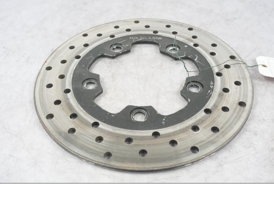 Framsidan på Bromsskiva från en Suzuki GSX-R 750 -2000 motorcykel.