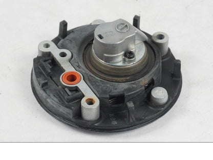 Snett uppifrån på <p>Låssats från Yamaha XT 1200 Z ABS 2011.</p>

<p>Cdi, tändningslås, antenn, tanklock, sadellås, toppboxlås och 3st nycklar. Finns en skada på sadellåsmekanismens skyddsgummi se bild.</p> motorcykel.