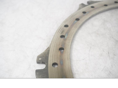 Baksidan på Bromsskiva från en Buell XB 12 -2006 motorcykel.