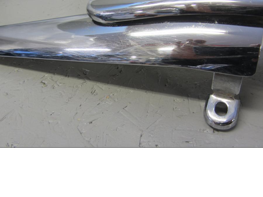 Baksidan på Värmeskydd från en Triumph Thunderbird 1600 -2011 motorcykel.