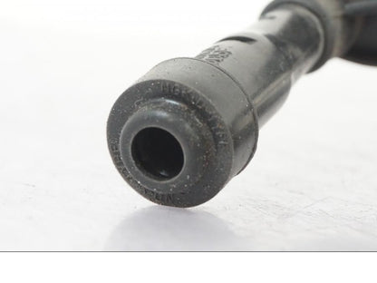 Snett nerifrån på Tändspole från en Honda NT 650 V -2002 motorcykel.