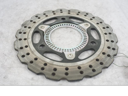 Höger sida på Bromsskiva från en Kawasaki Ninja 300 -2013 motorcykel.