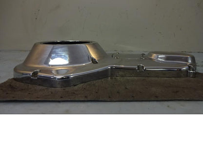 Vänster sida på Transmissionskåpa från en H-D Touring Road King Custom FLHRSI -2004 motorcykel.