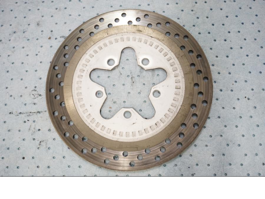 Framsidan på Bromsskiva från en Kawasaki Ninja H2 -2019 motorcykel.