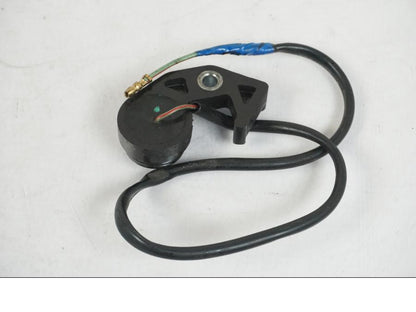 Vänster sida på Växelindikator från en Honda CBR 125 R -2006 motorcykel.