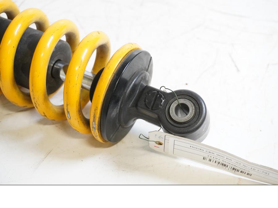 Vänster sida på Stötdämpare från en Honda CBR 900 RR -2002 motorcykel.