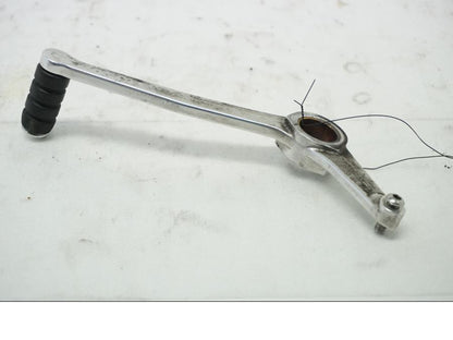 Baksidan på Växelpedal från en BMW S 1000 RR -2010 motorcykel.